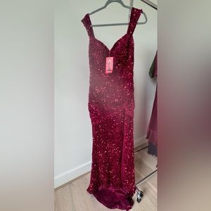 Red sequin gown. Never worn with original tags